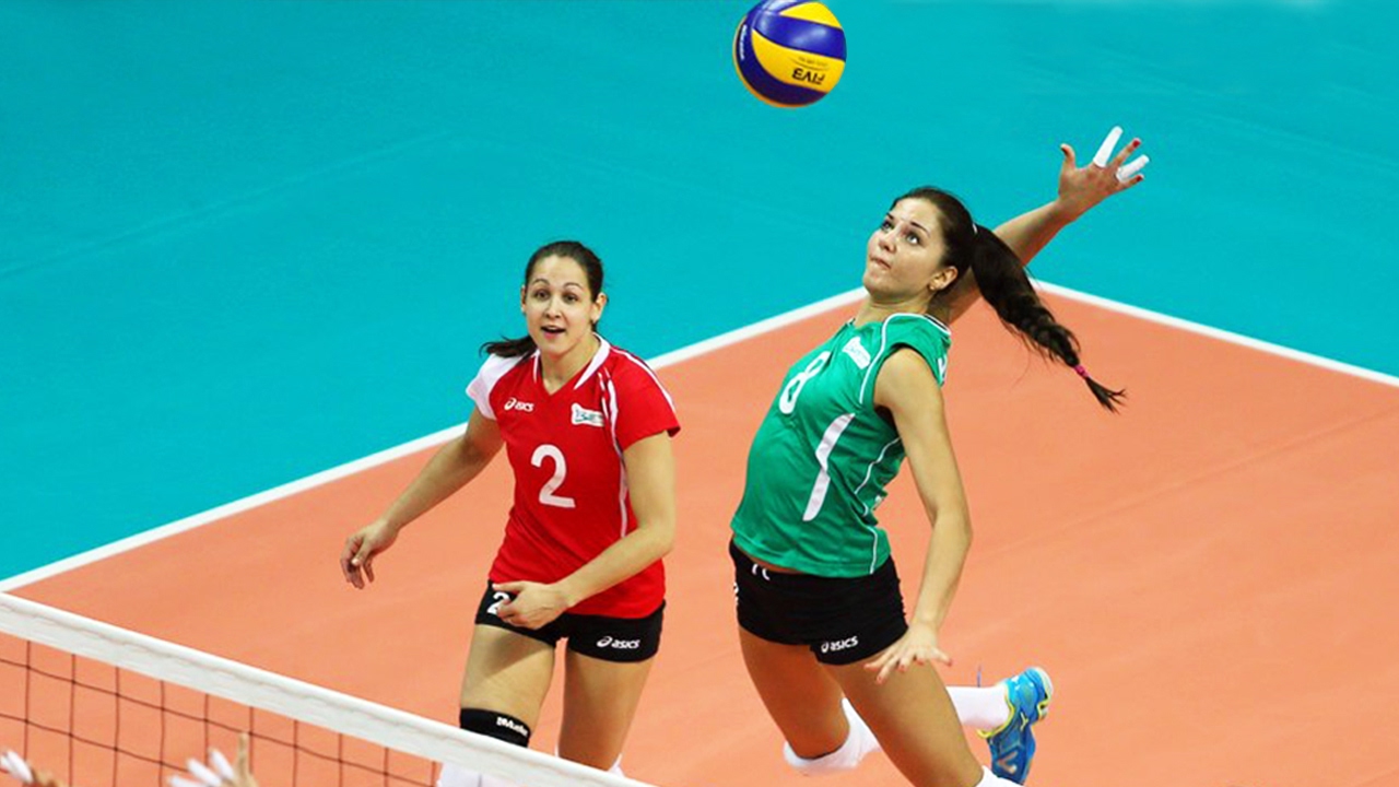 A volleyball player returning the ball